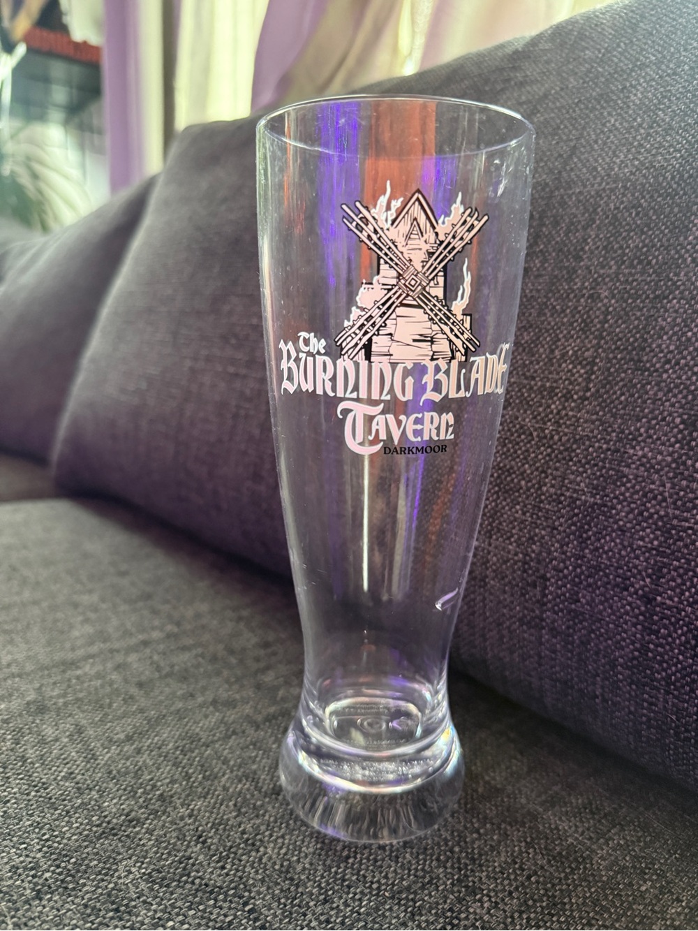the Burning Blade Tavern Darkmoor Epic Universe Pilsner Glass - Clear plastic